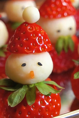Strawberry character with cheese face on a strawberry base